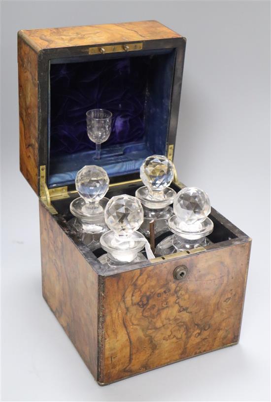 A burr walnut four decanter casket, with Bramah lock